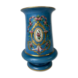 Vase bleu à motifs de fleurs et dorures