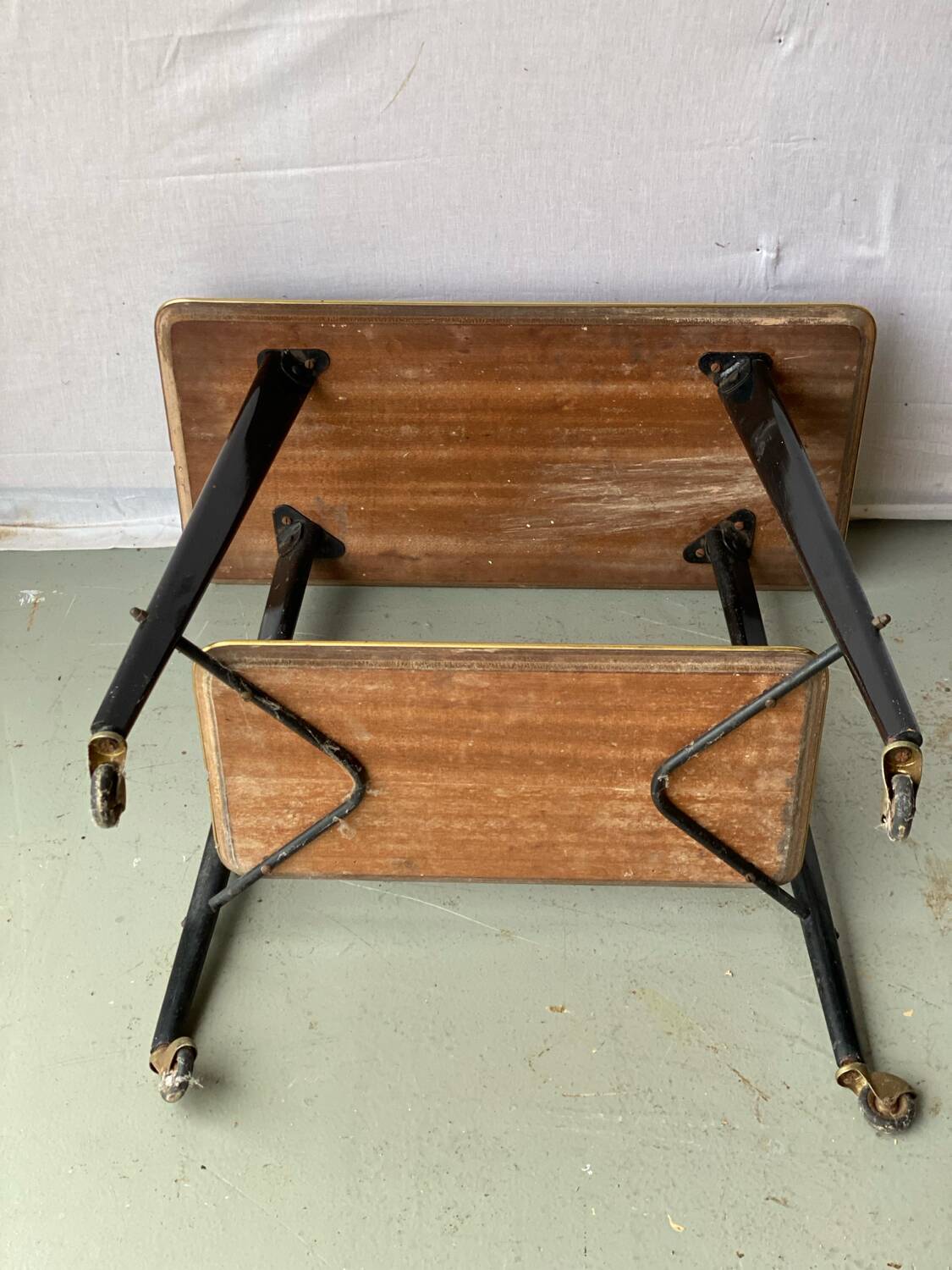 Vintage rosewood serving table on wheels from the 60s