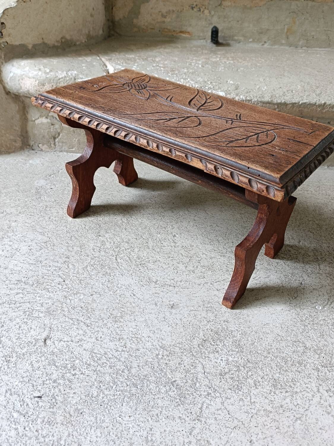 Antique footrest