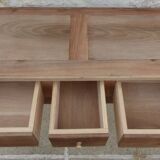 Console in solid walnut with a natural finish, featuring three drawers with a belt.