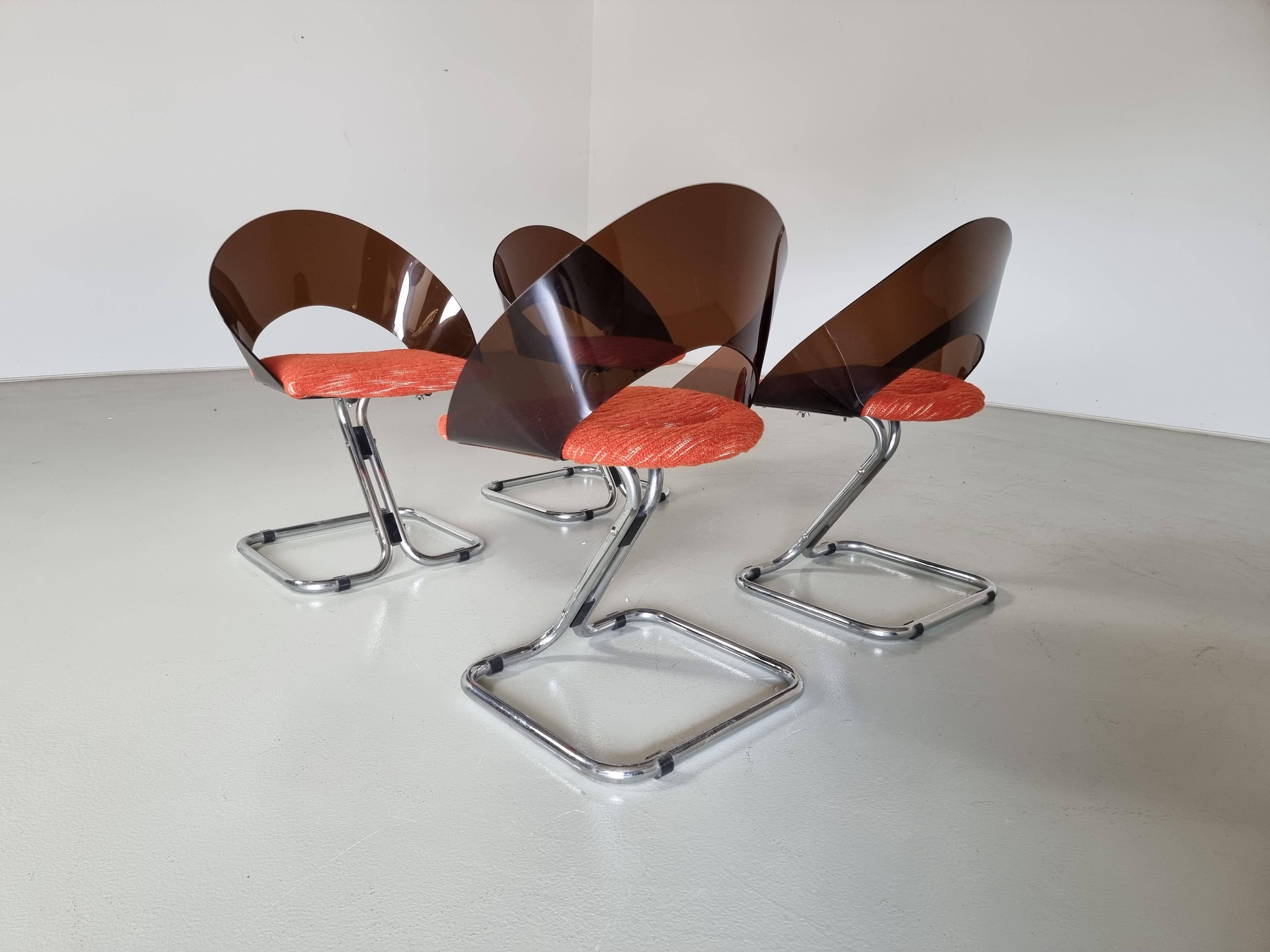 Set of 4 Italian dining chairs in plexiglass from the Spage era, 1970.