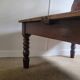 Wooden coffee table with turned legs