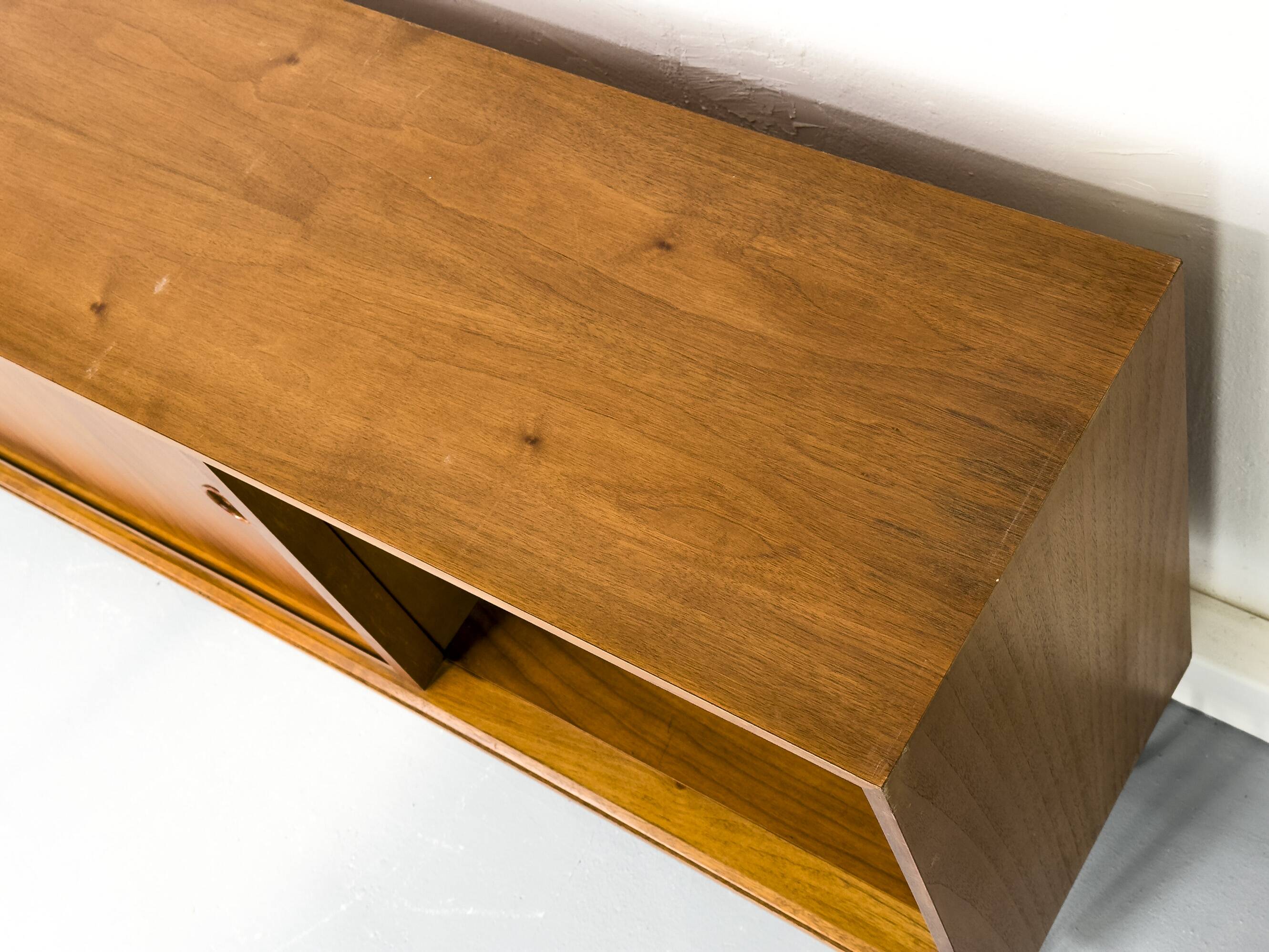 Walnut sideboard with sliding doors by Franzmeyer, 1959