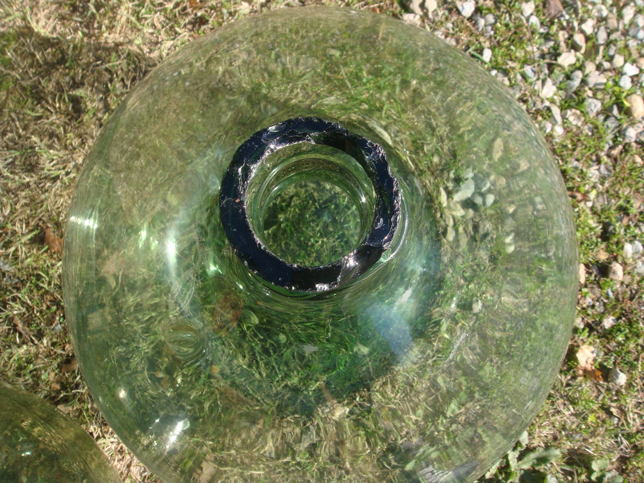 Great demijohn in blown glass