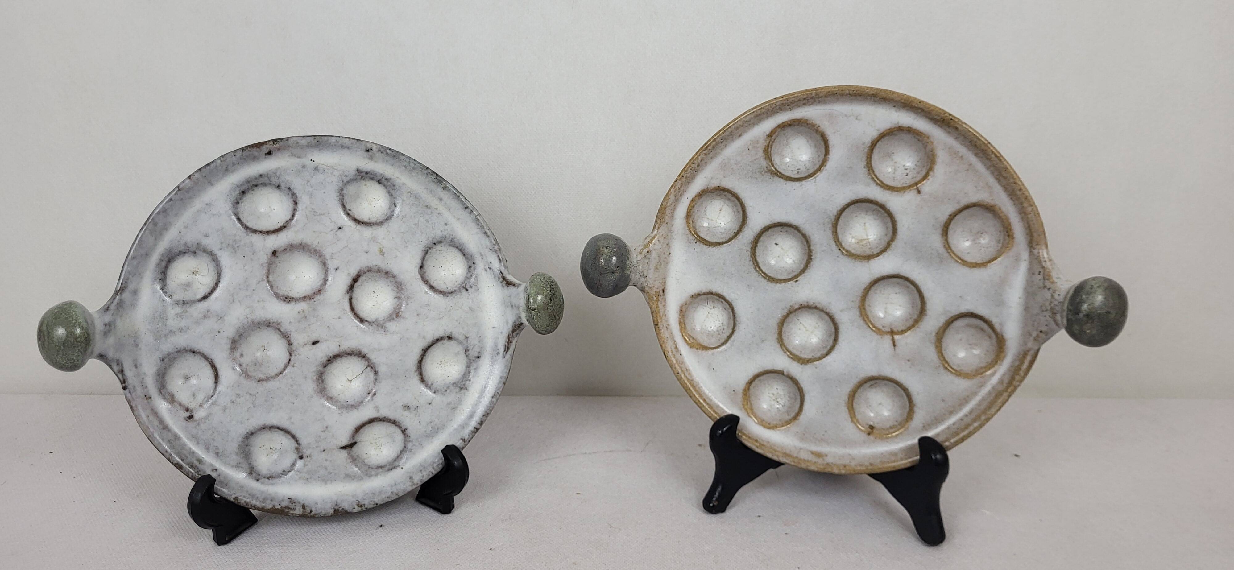 4 stoneware snail plates
