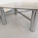 Square Italian vintage Space Age coffee table in smoked glass and metal.