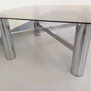 Square Italian vintage Space Age coffee table in smoked glass and metal.