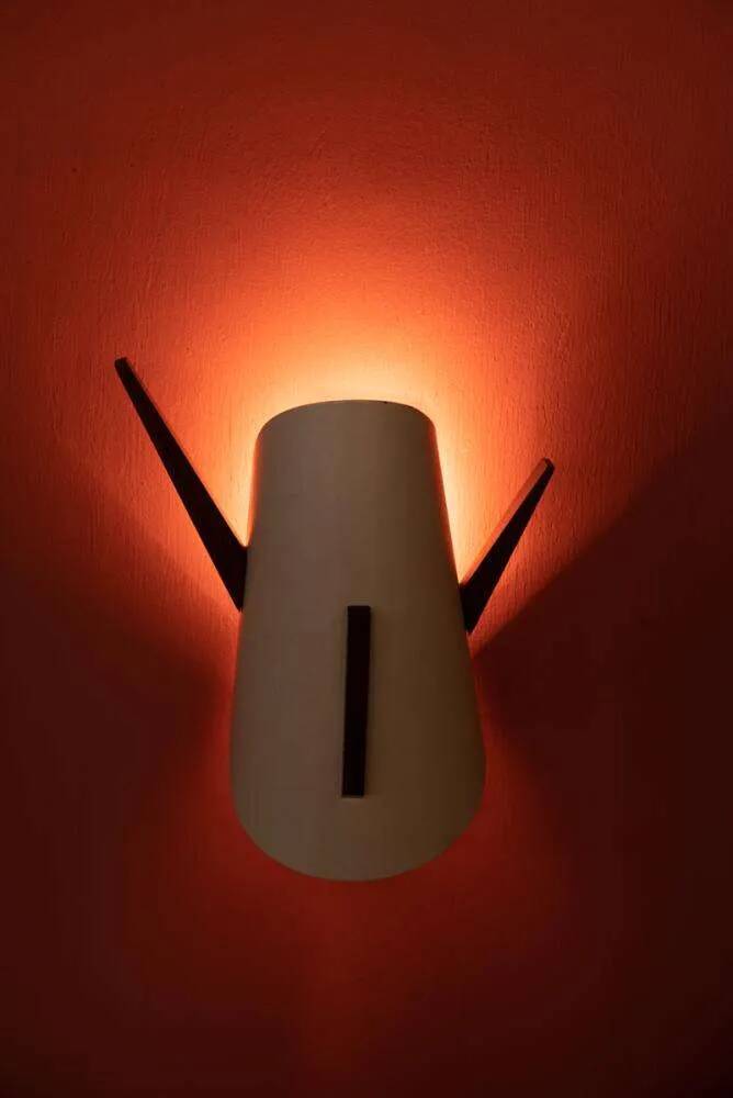Vintage wall lamp from the 60s, teak and mid-century metal.