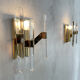 Pair of wall lamps in glass and gilded metal Sciolari