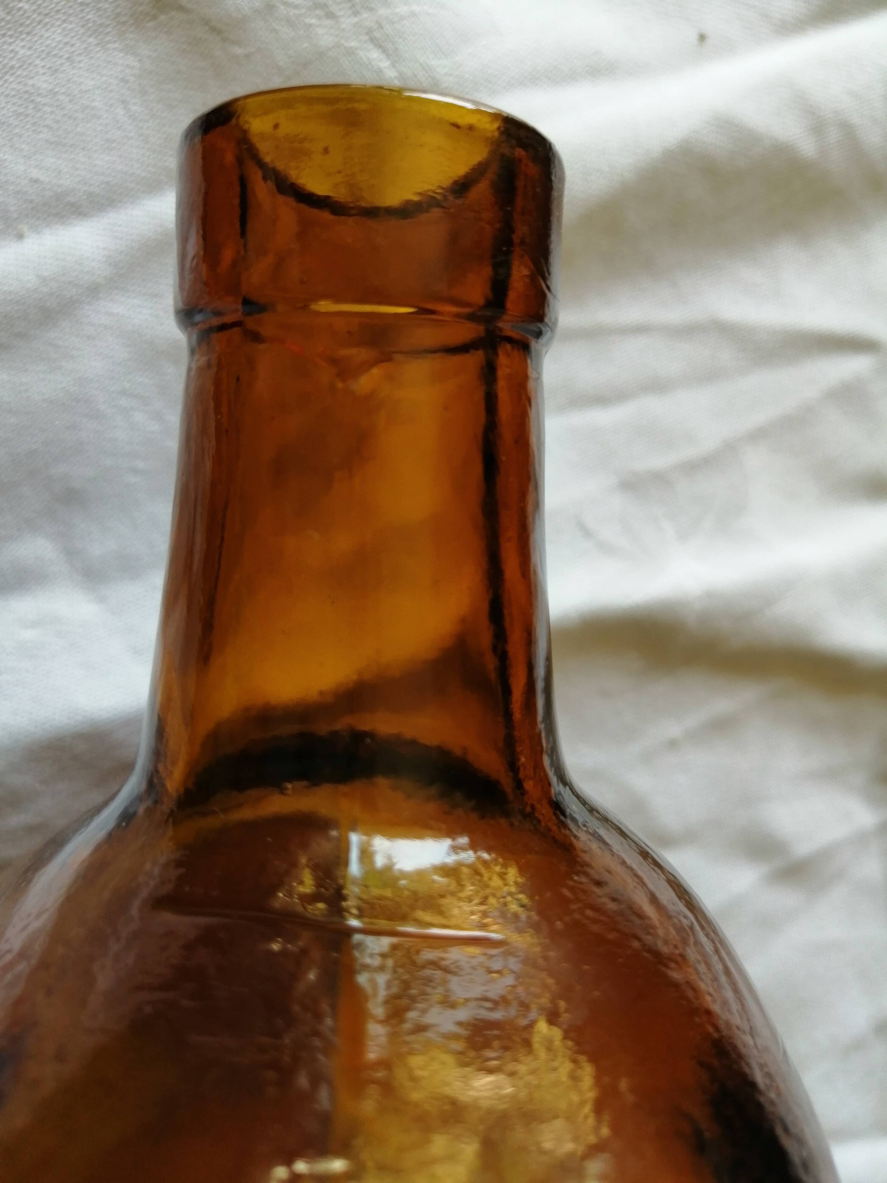 Vintage 6 sided amber bottle