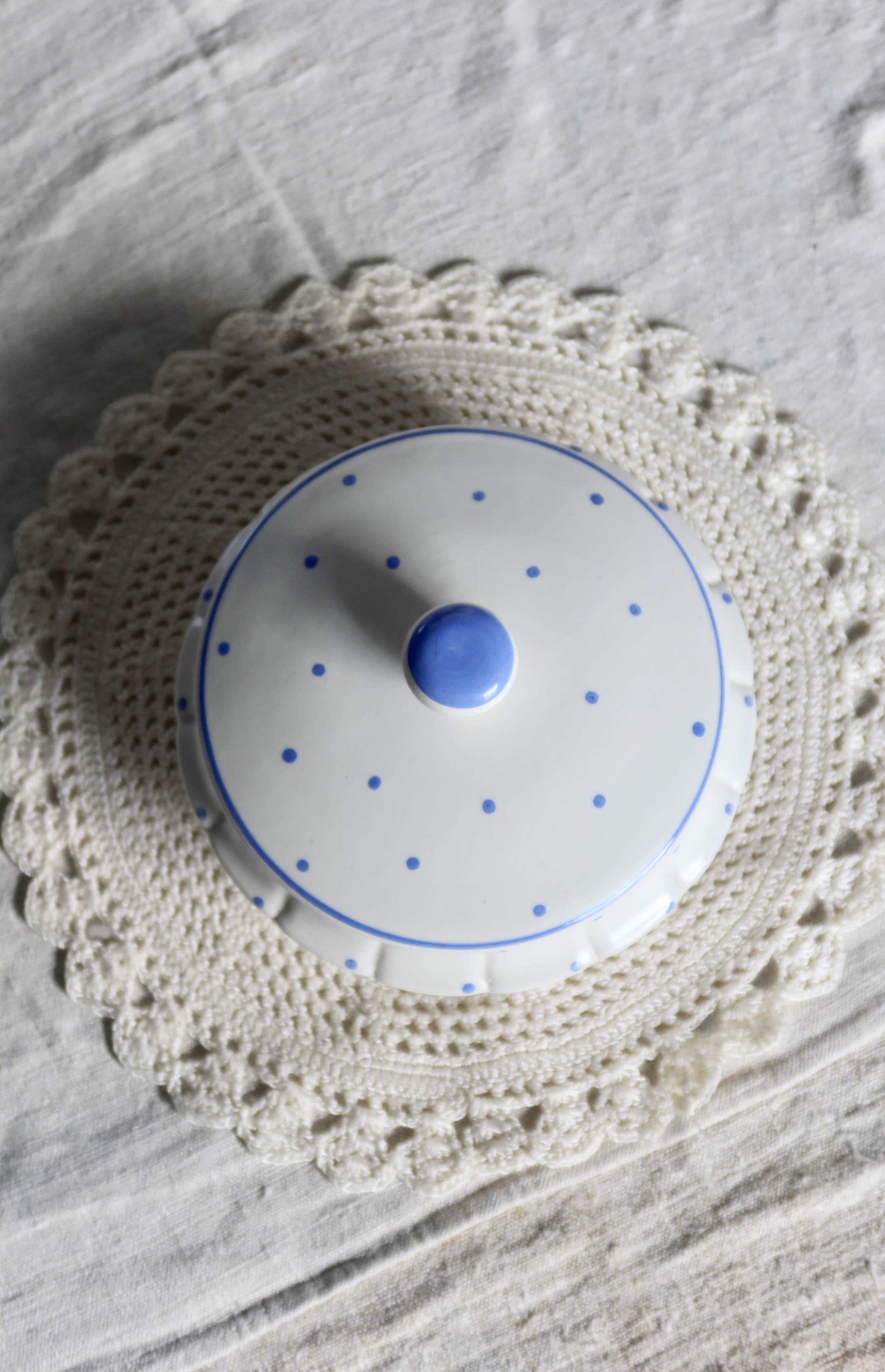 Vintage ivory earthenware candy box with blue polka dots