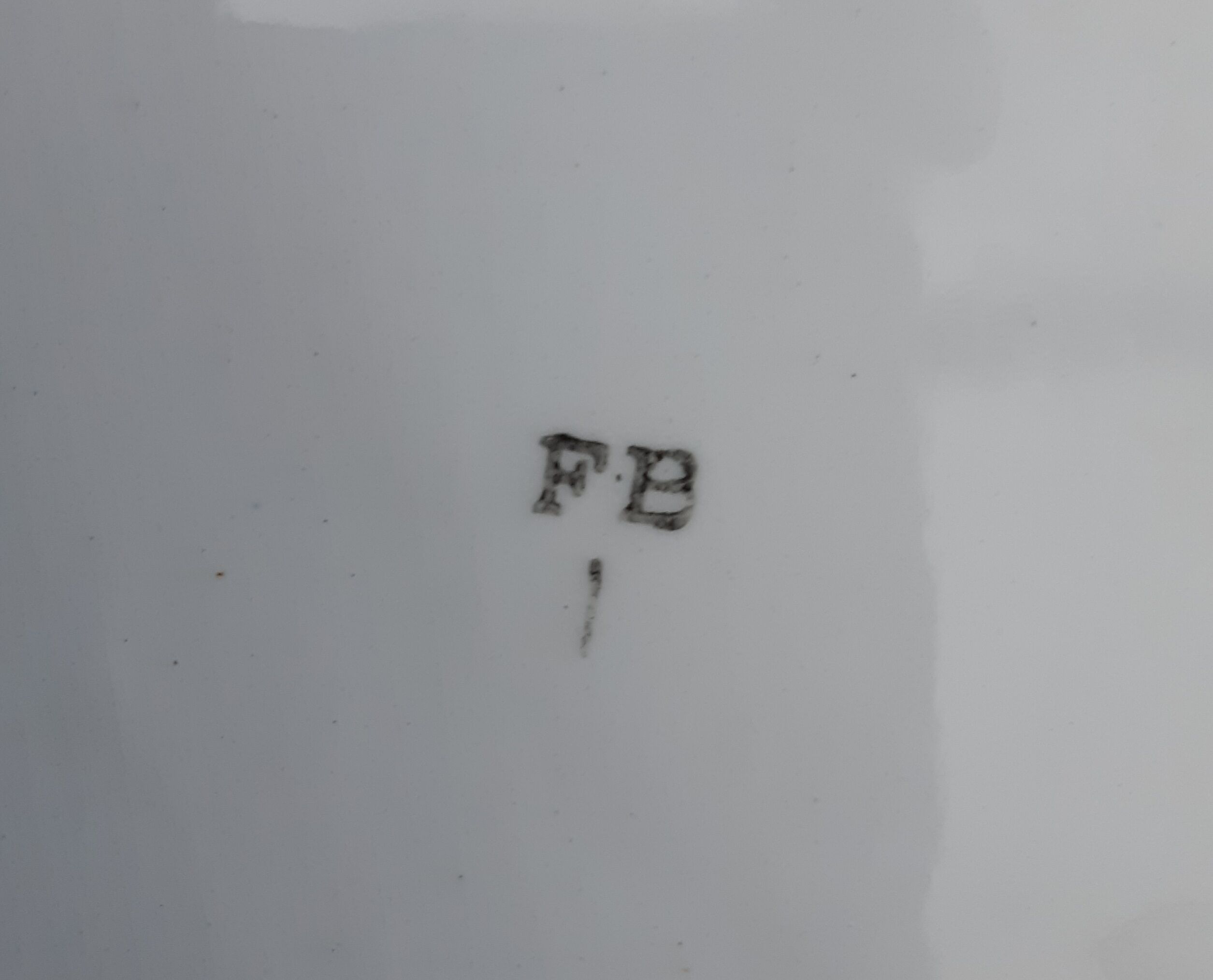 Flat oval faience of Badonviller