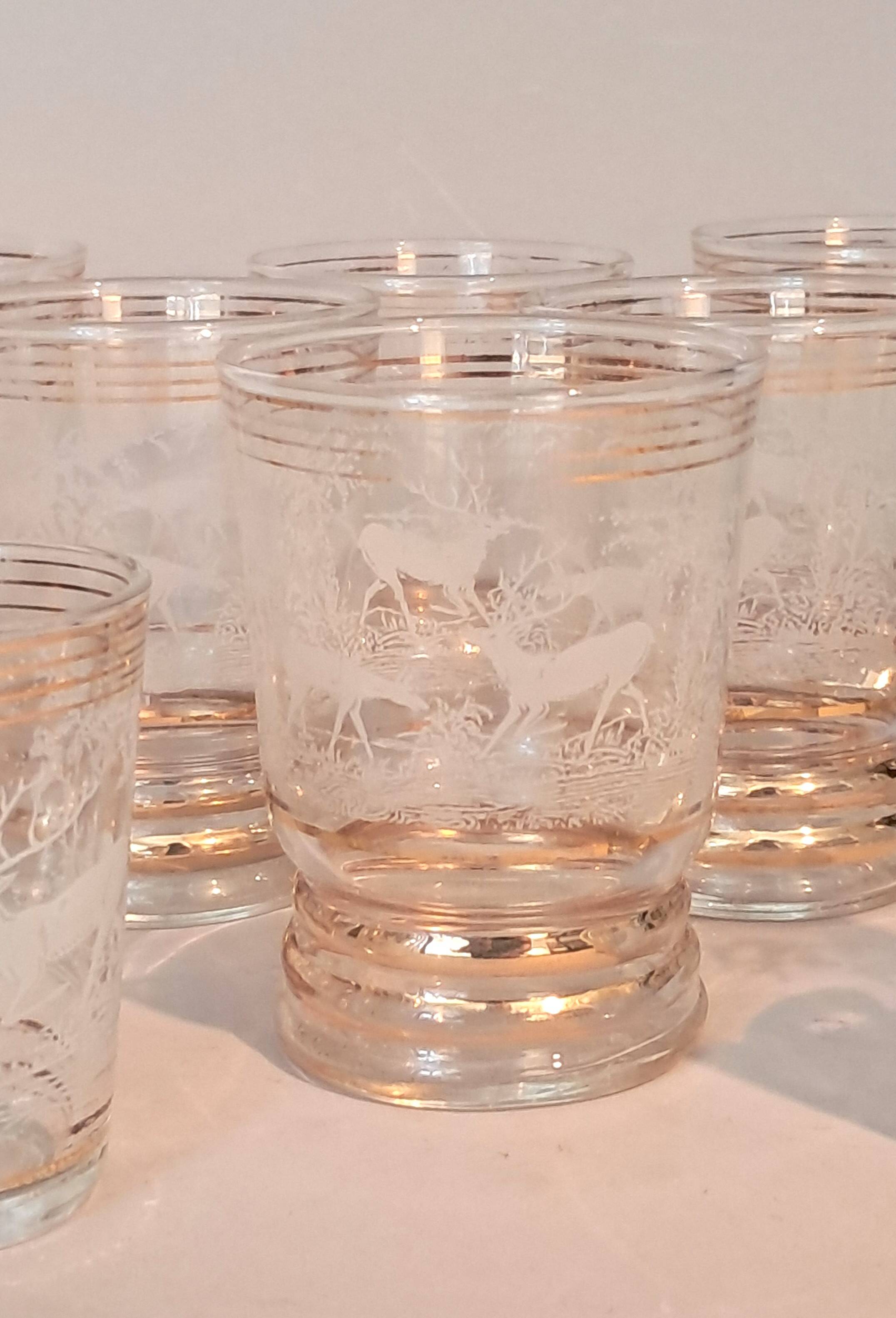Service of 14 gold-plated and engraved glasses with a deer in the woods design from 1950
