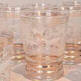 Service of 14 gold-plated and engraved glasses with a deer in the woods design from 1950