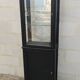 Old two-door shop showcase with black patina