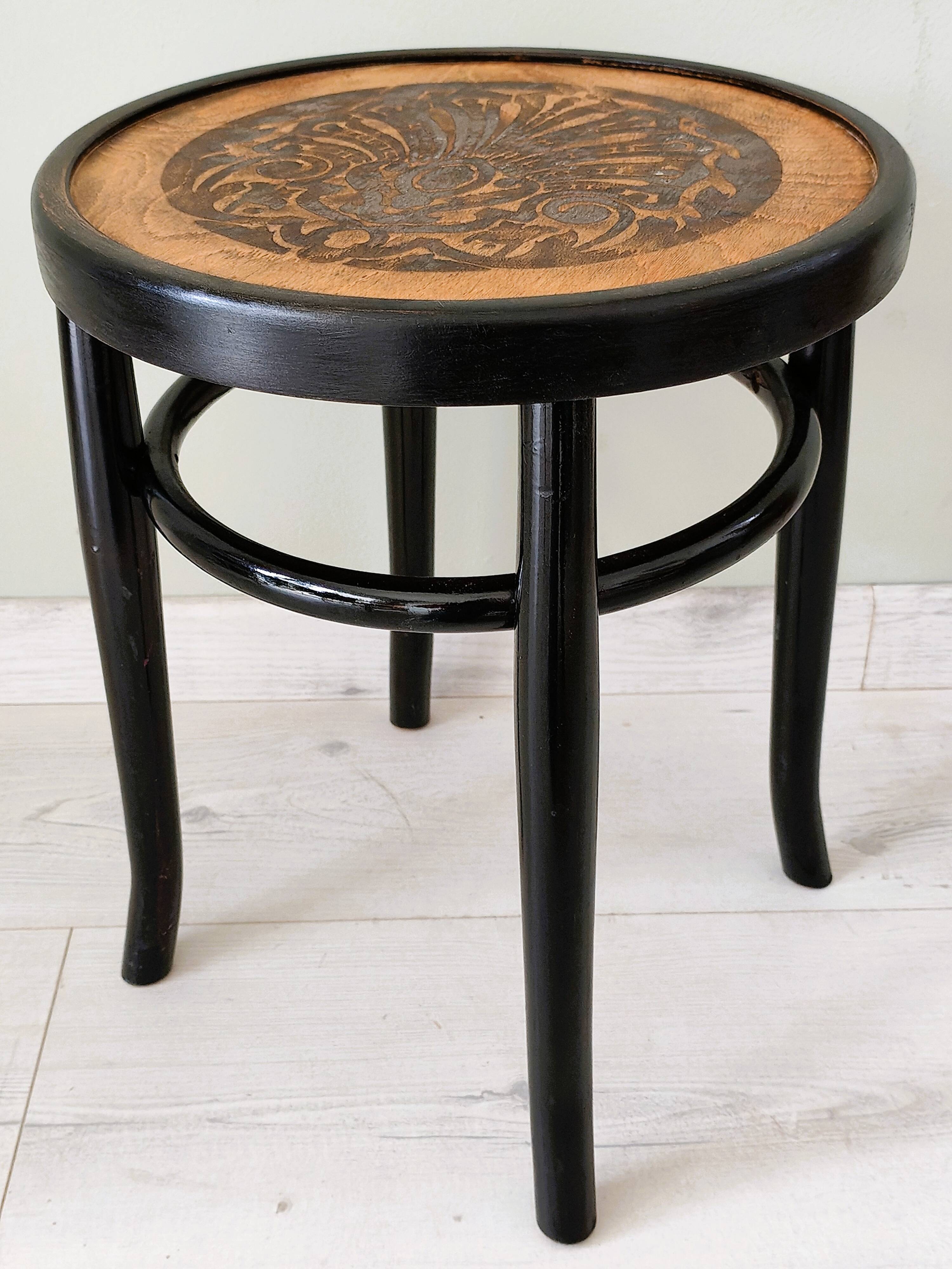 Stool in the style of Thonet made of solid wood.