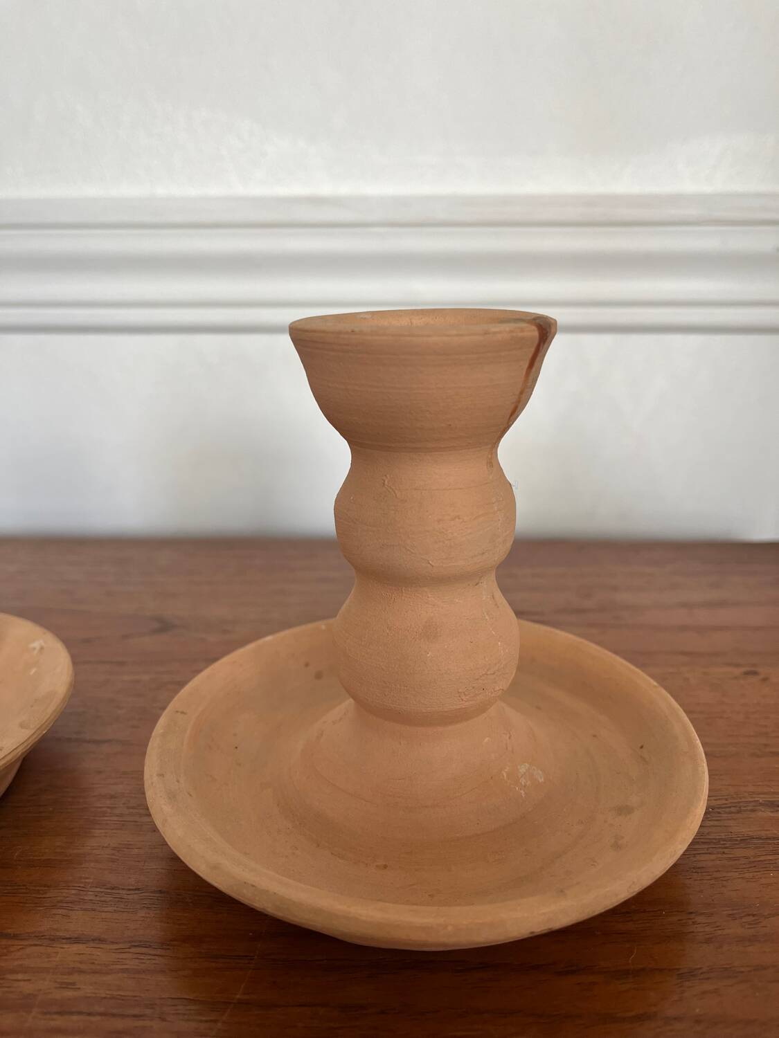 Pair of terracotta candlesticks