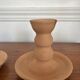 Pair of terracotta candlesticks