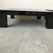 Pair of black laqué wood coffee tables, circa 1970.