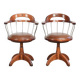 Set of 2 swivel/office chairs with a cognac-coloured cow leather seat