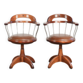 Set of 2 swivel/office chairs with a cognac-coloured cow leather seat