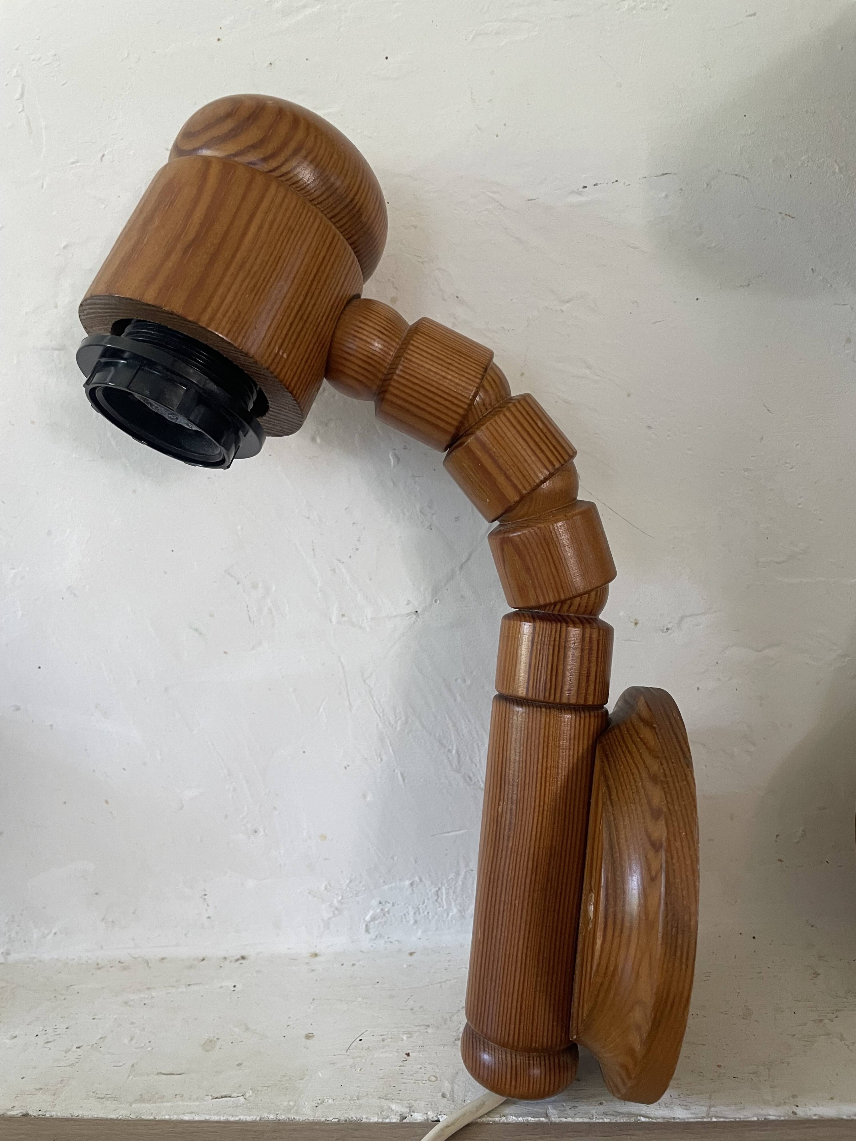 Pair of articulated Scandinavian wall lights SOLBACKEN in vintage wood