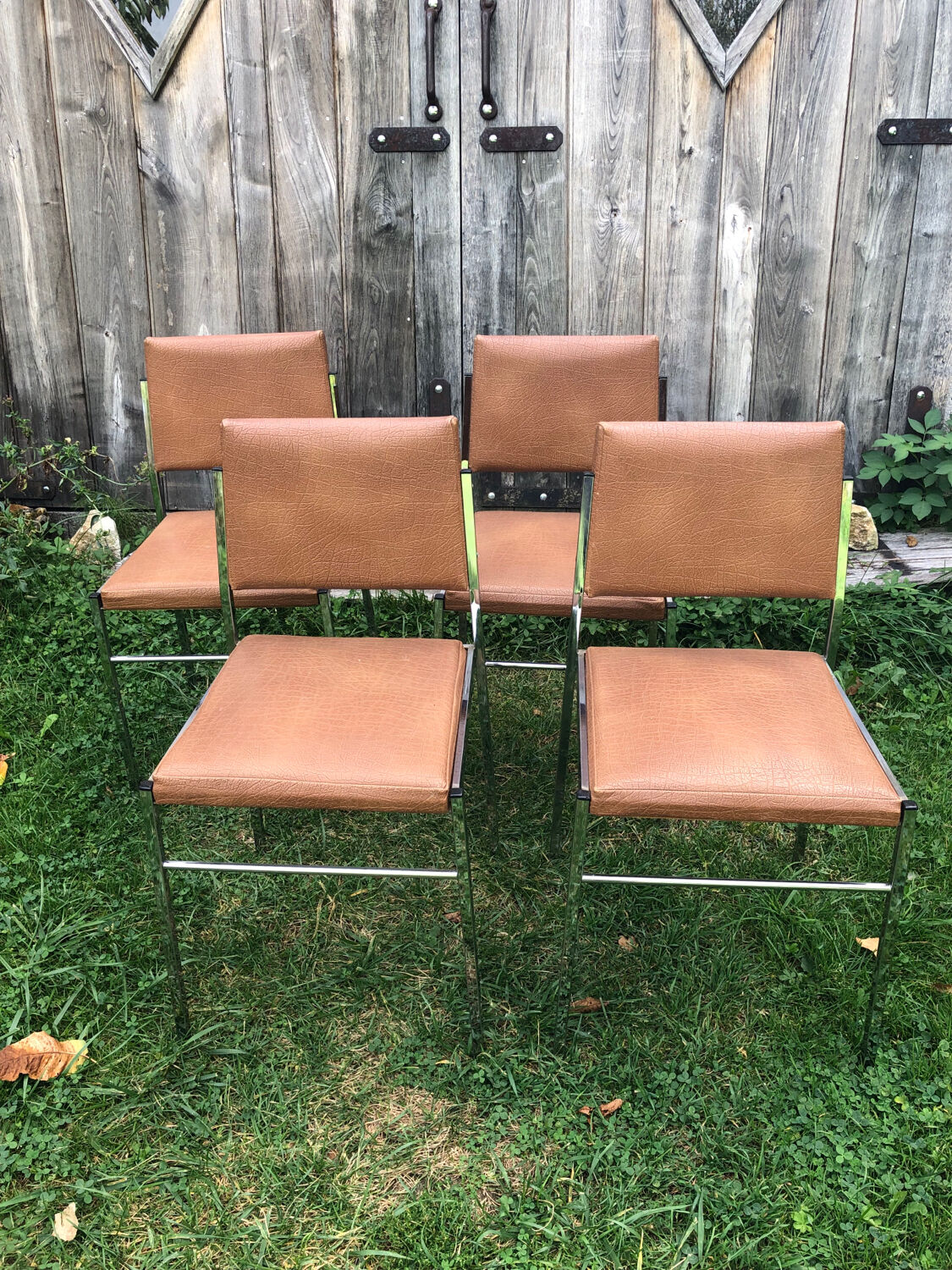 Skai and chrome chairs