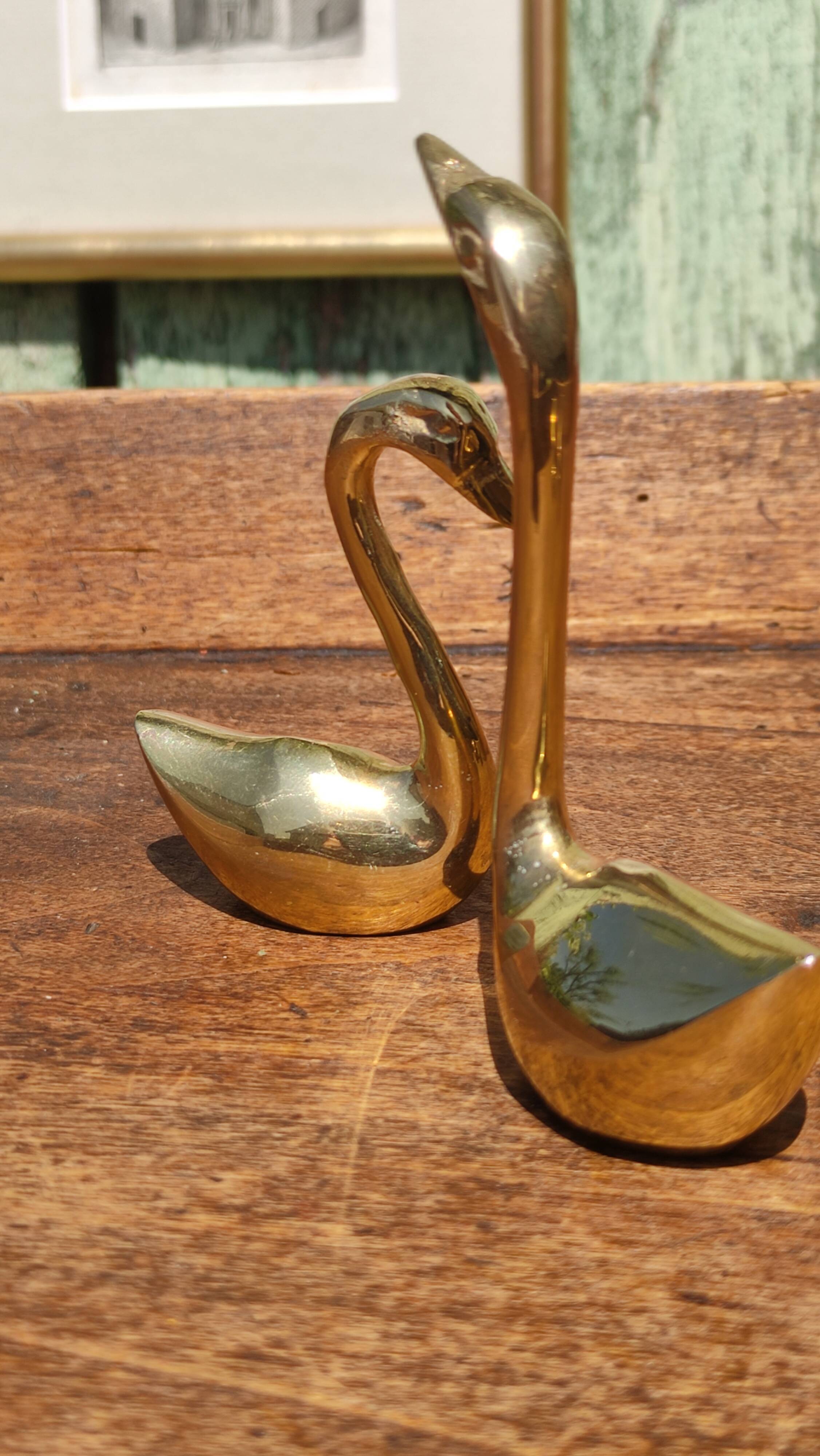 Pair of golden brass swans