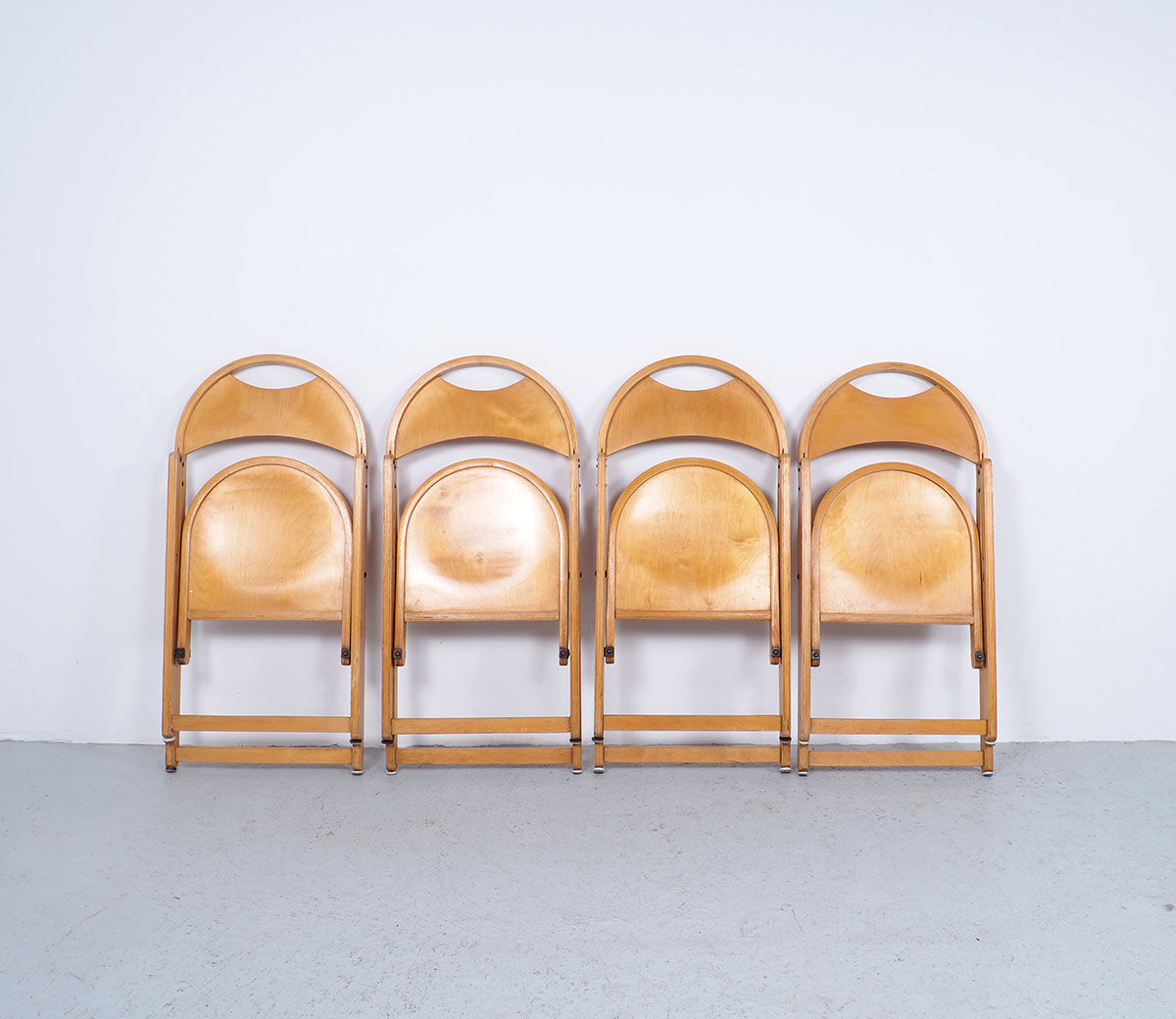 4 chaises pliantes vintage en bois d’OTK, années 1950