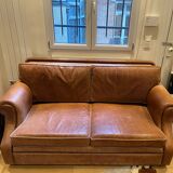 Brown braided leather sofa
