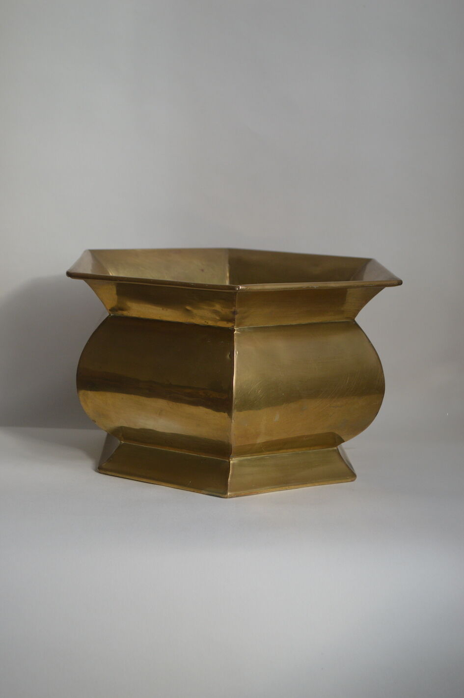 Brass pot cover