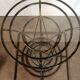 Wrought iron dining table with beveled round glass top, vintage 1980
