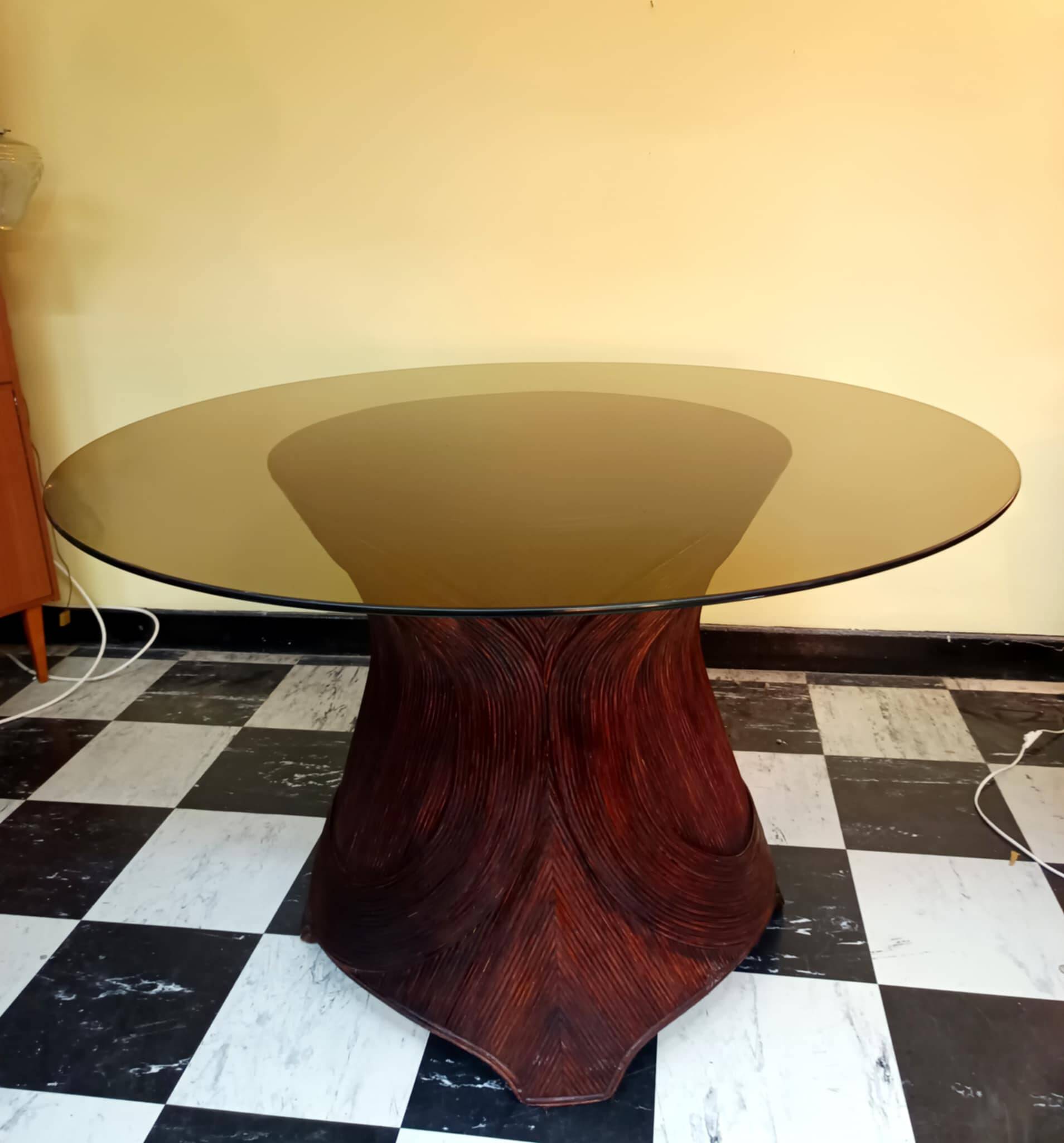 Dining table with rattan marquetry