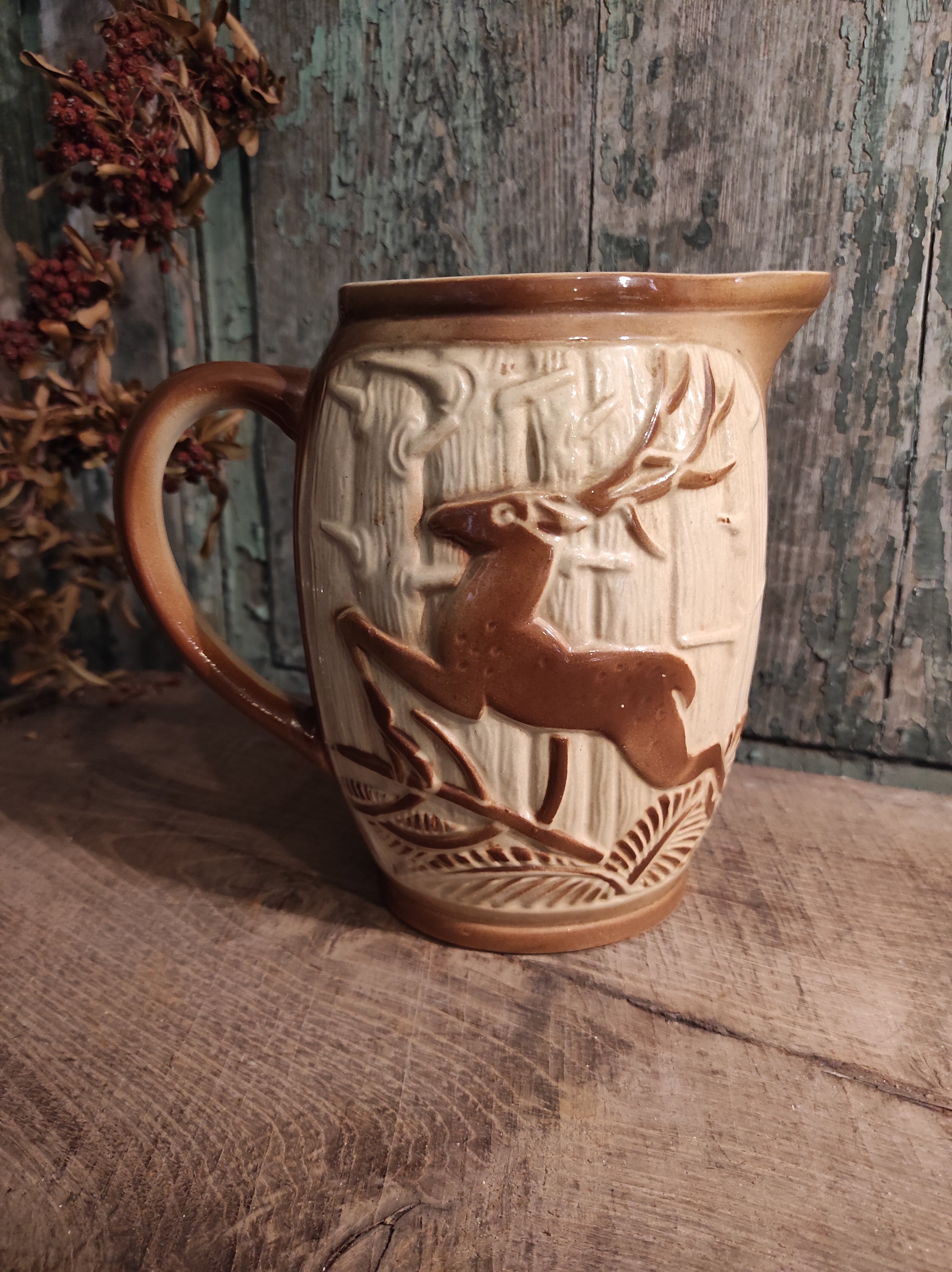 French vintage pitcher of St Clément, with a deer