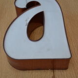 Teaches letter "a" in plexiglass