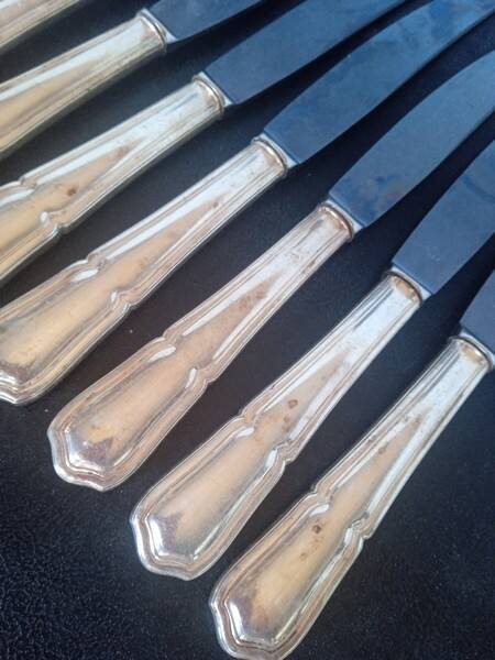 12 knives + silver metal punch from the 1950s