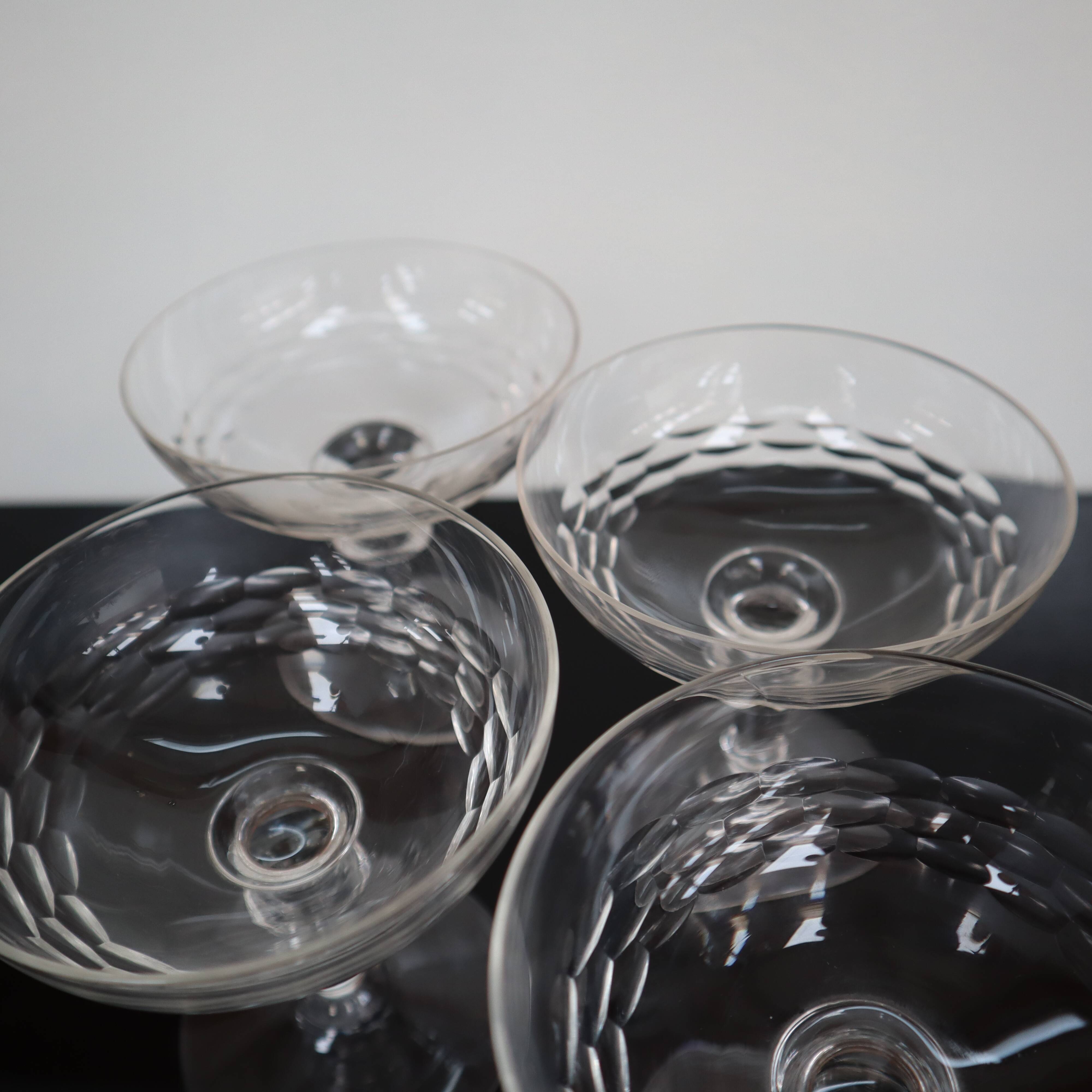 Set of 4 20th century chiseled glass champagne glasses