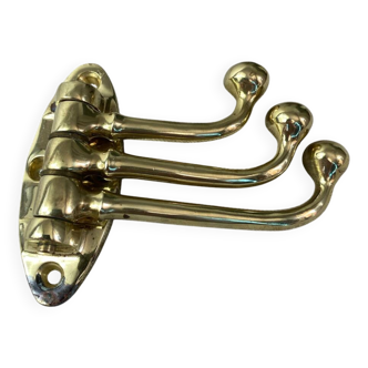 Coat hook with three-pronged folding hooks in brass