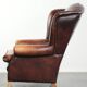 Comfortable cowhide wingback armchair in English style