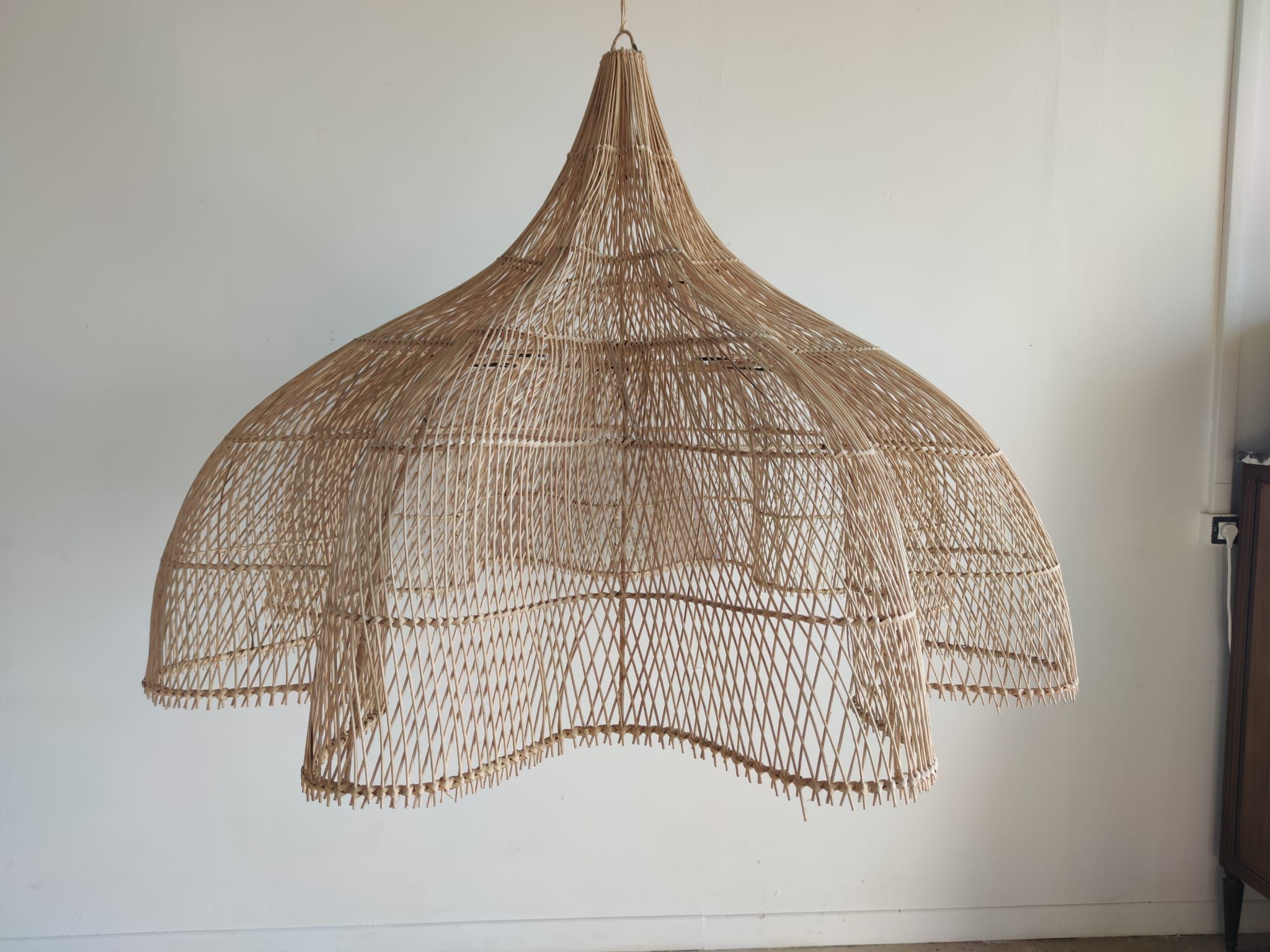 Huge rattan suspension in the shape of a corolla H:1m; D: 1m50