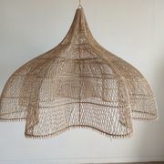Huge rattan suspension in the shape of a corolla H:1m; D: 1m50