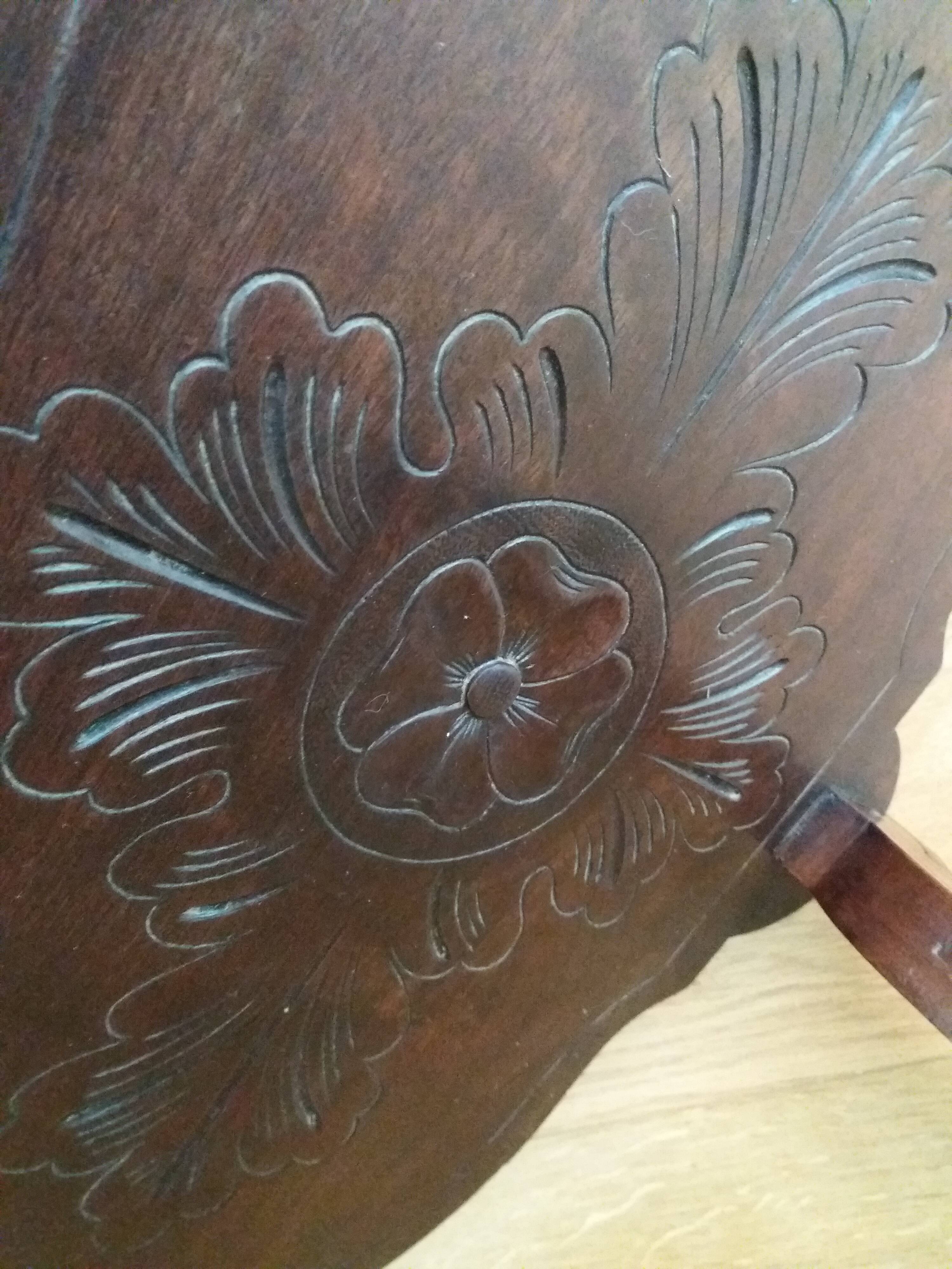 Triplet console harness in carved wood