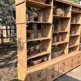 Large antique workshop furniture with drawers and shelves.