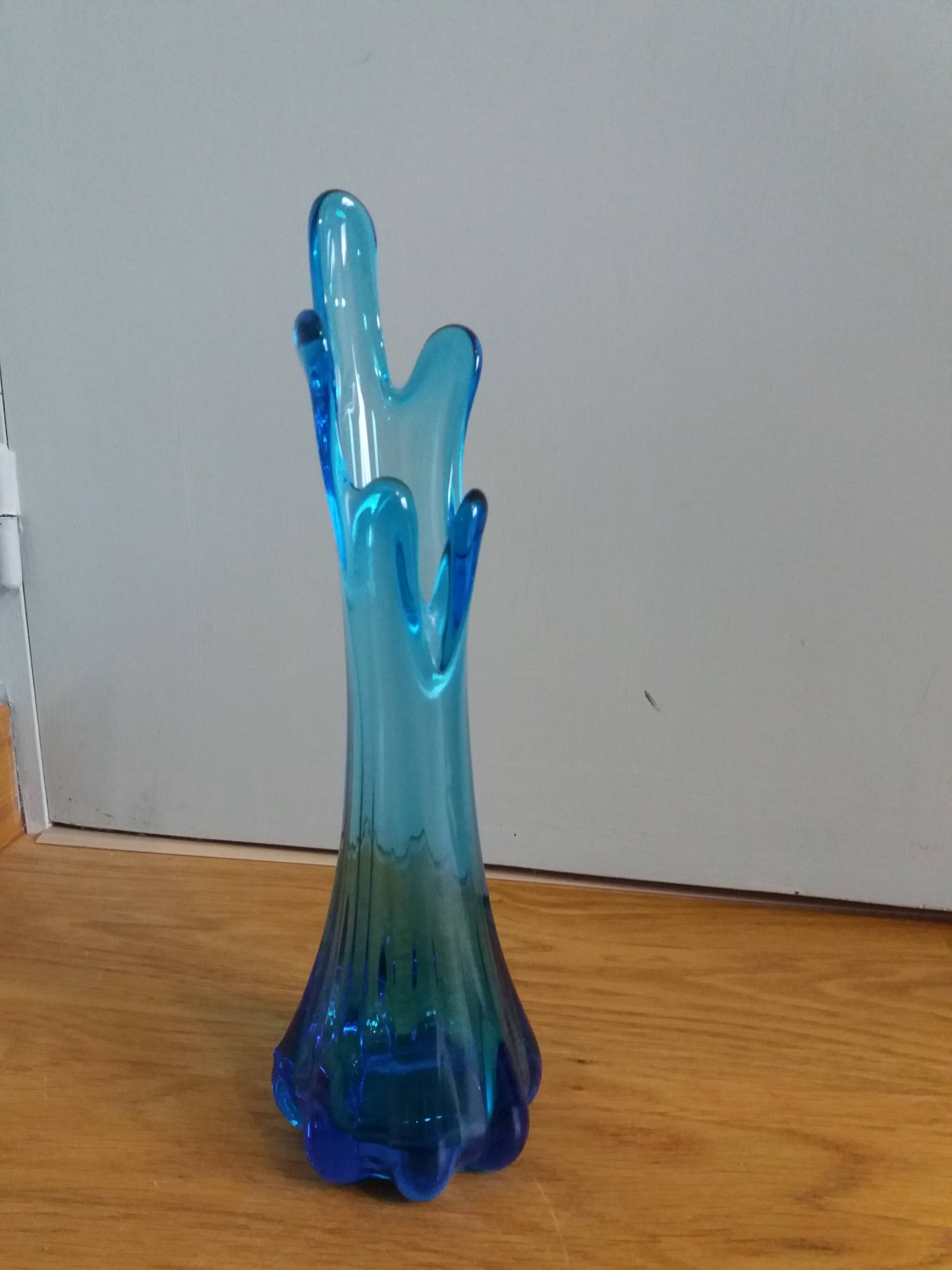 Turquoise blue blown glass vase
