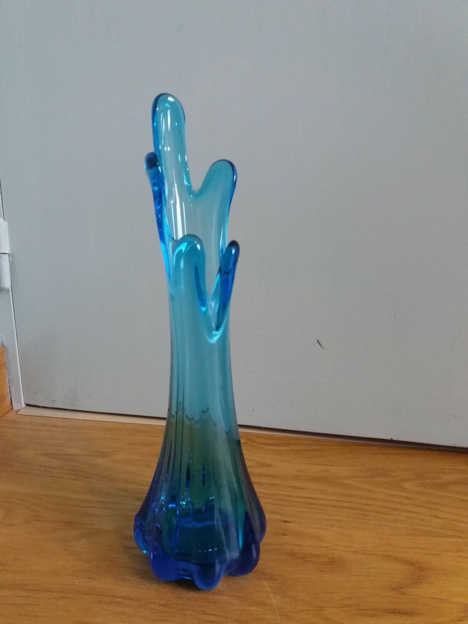 Turquoise blue blown glass vase