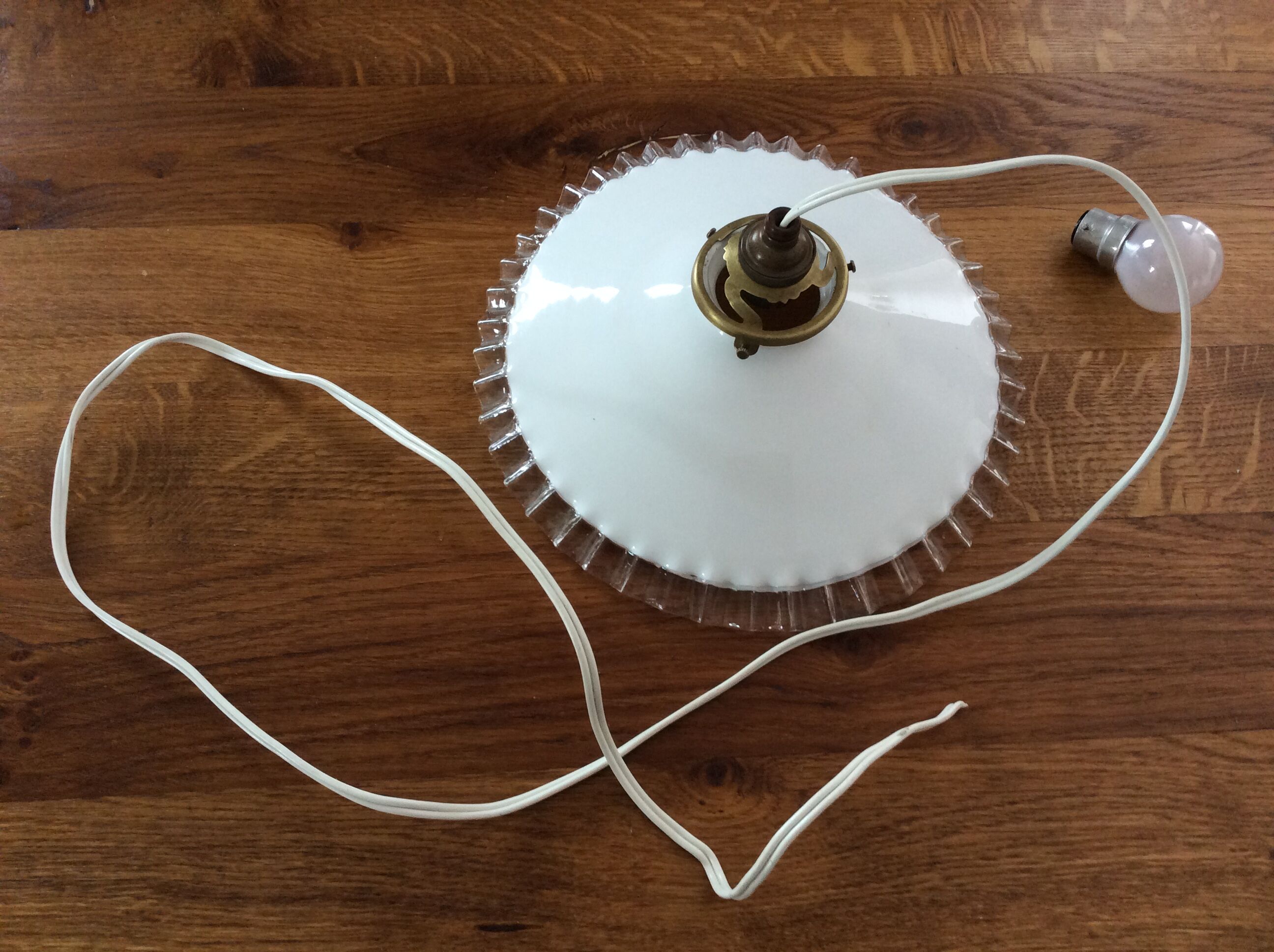 Old suspension in dented opaline