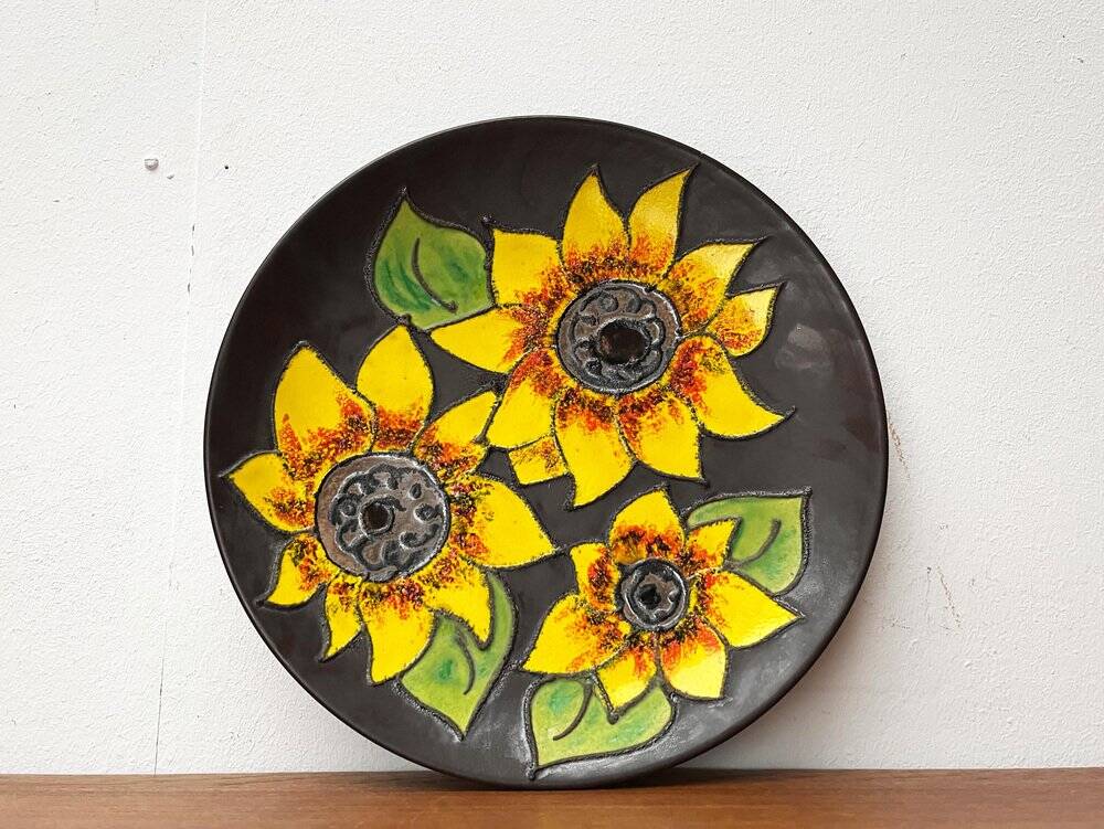 Mid-century German studio pottery wall plate with Ruscha sunflower motif, 1960s.