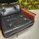 Fauteuil lounge cuir noir 1970 vintage
