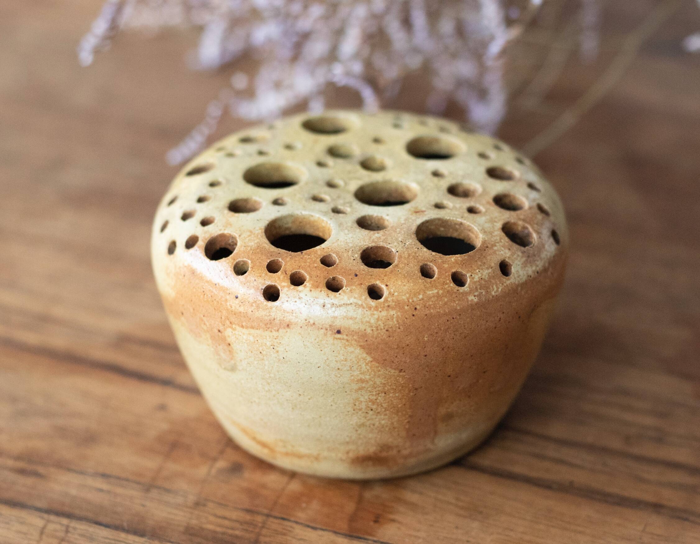 Signed sandstone flower pick