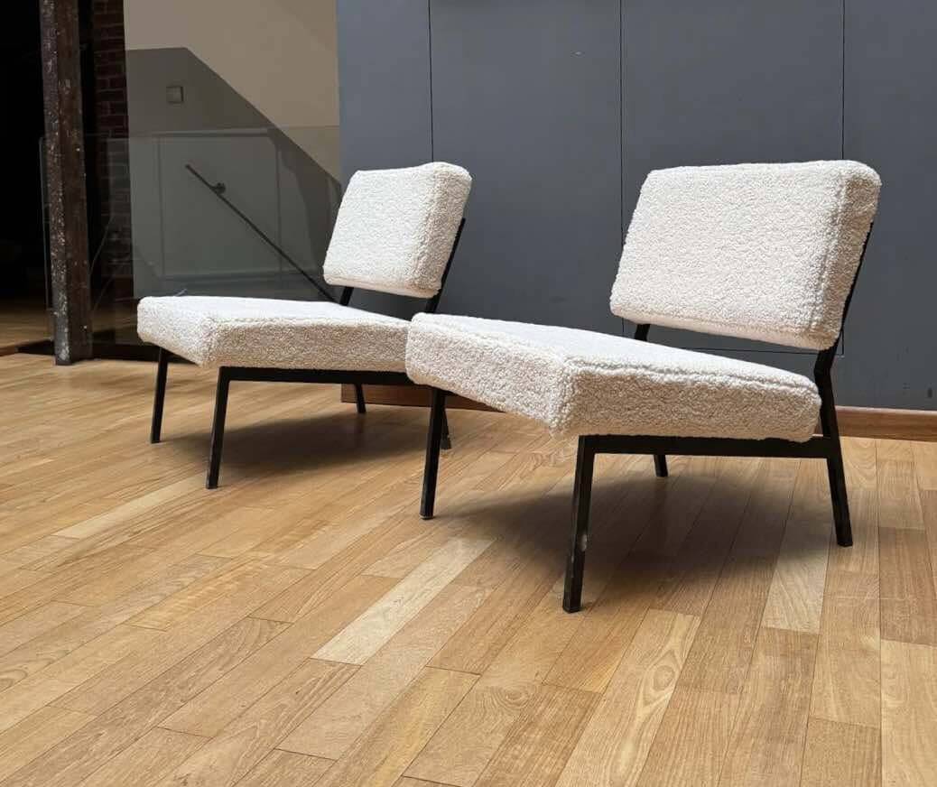 Pair of vintage armchairs, black metal and sheepskin fabric, France 1950.